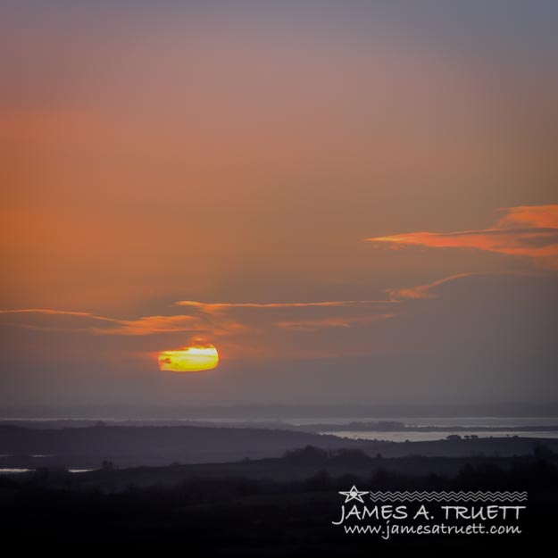 Irish Sunrise Scattering Light over Shannon River Valley